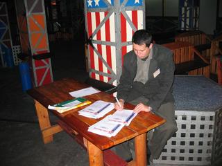 Paul Pavlov is signing diplomas